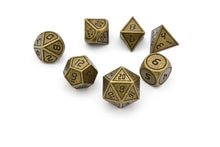 Load image into Gallery viewer, Ancient Gold Tech Metal Dice Set 7 piece placed to form a circle 