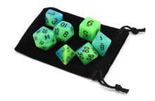 Load image into Gallery viewer, Blue and Green dual colour glow in the dark dice set 7 piece with dice bag