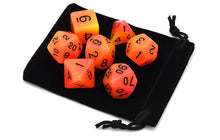 Load image into Gallery viewer, Orange and Yellow dual colour glow in the dark dice set 7 piece with dice bag