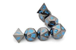 Onyx Chrome Metal Dice set with Frost Blue Font 7 piece stacked horizontally