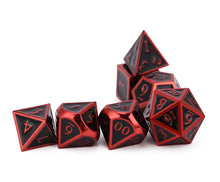 Load image into Gallery viewer, Scarlet the mysterious - Black metal dice set with red font 7 piece stacked horizontally 