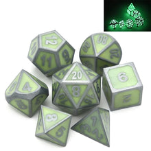 Load image into Gallery viewer, Enchanted Green Metal Dice Set in the light | 7 piece